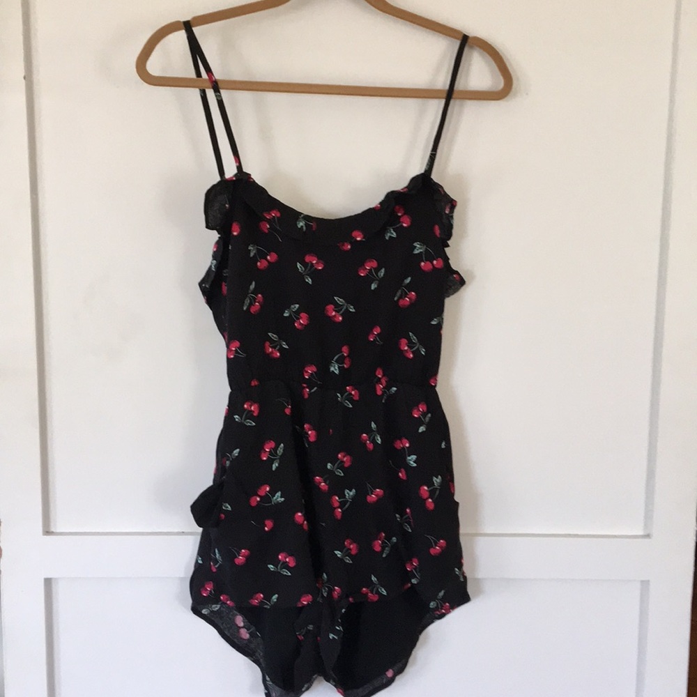 Black and red cherry printer romper.
